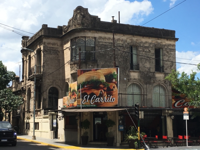 An old building that now serves hamburgers downstairs