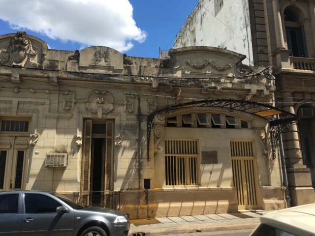 Old building with pretty bus shelter
